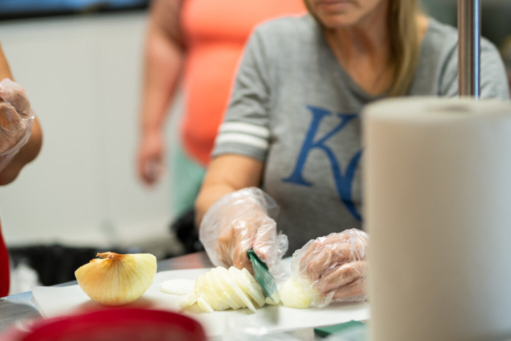 Woman cutting onions